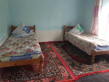 Фото номера Односпальная кровать в общем номере для мужчин и женщин Гостевой дом Paradise Guest House г. Arslanbob 5