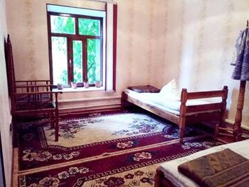 Фото номера Двухместный номер с 2 отдельными кроватями Гостевой дом Riverside Guest house Mashkhur г. Arslanbob 14