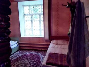 Фото номера Двухместный номер с 2 отдельными кроватями Гостевой дом Riverside Guest house Mashkhur г. Arslanbob 18