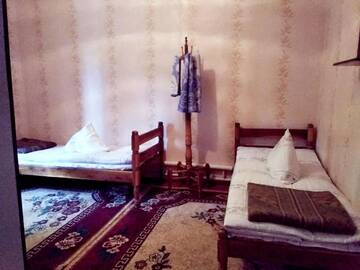 Фото номера Двухместный номер с 2 отдельными кроватями Гостевой дом Riverside Guest house Mashkhur г. Arslanbob 6