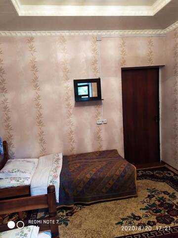 Фото номера Двухместный номер с 2 отдельными кроватями Гостевой дом Riverside Guest house Mashkhur г. Arslanbob 4