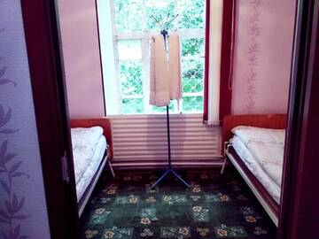 Фото номера Двухместный номер с 2 отдельными кроватями Гостевой дом Riverside Guest house Mashkhur г. Arslanbob 7