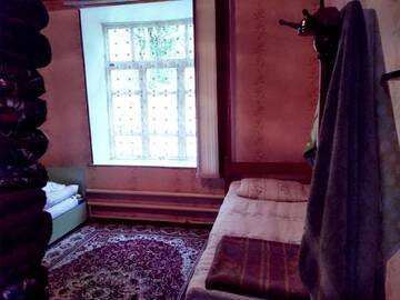 Фото номера Двухместный номер с 2 отдельными кроватями Гостевой дом Riverside Guest house Mashkhur г. Arslanbob 11