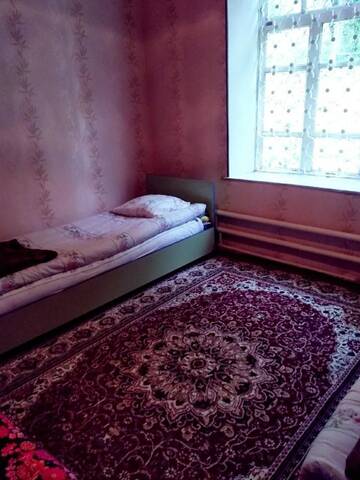 Фото номера Двухместный номер с 2 отдельными кроватями Гостевой дом Riverside Guest house Mashkhur г. Arslanbob 10